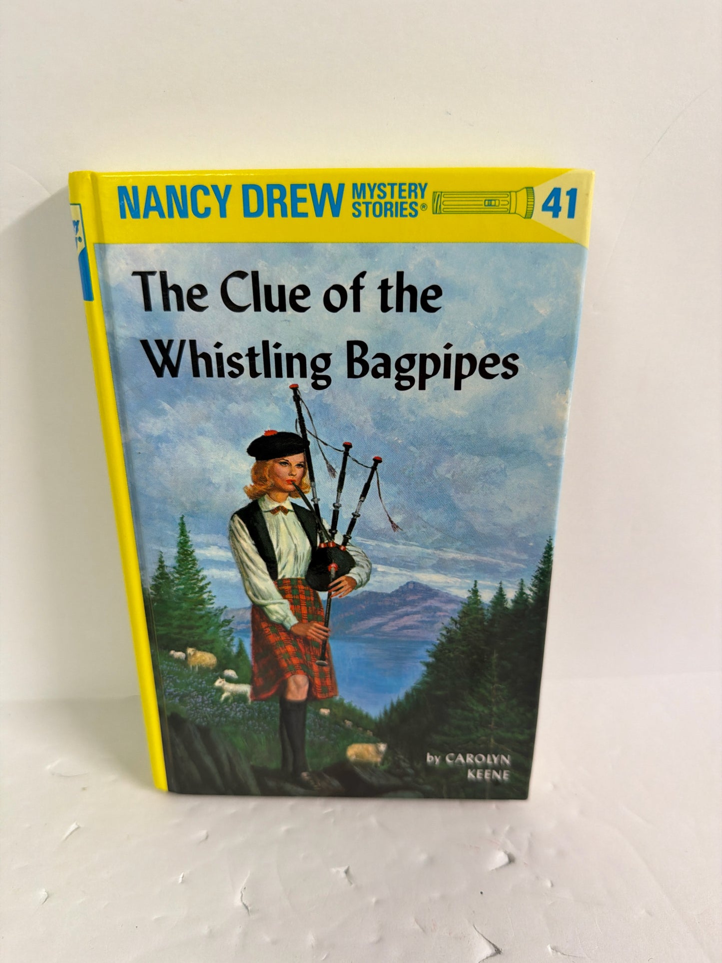 The Clue of the Whistling Bagpipes Grosset & Dunlap Pre-Owned Fiction