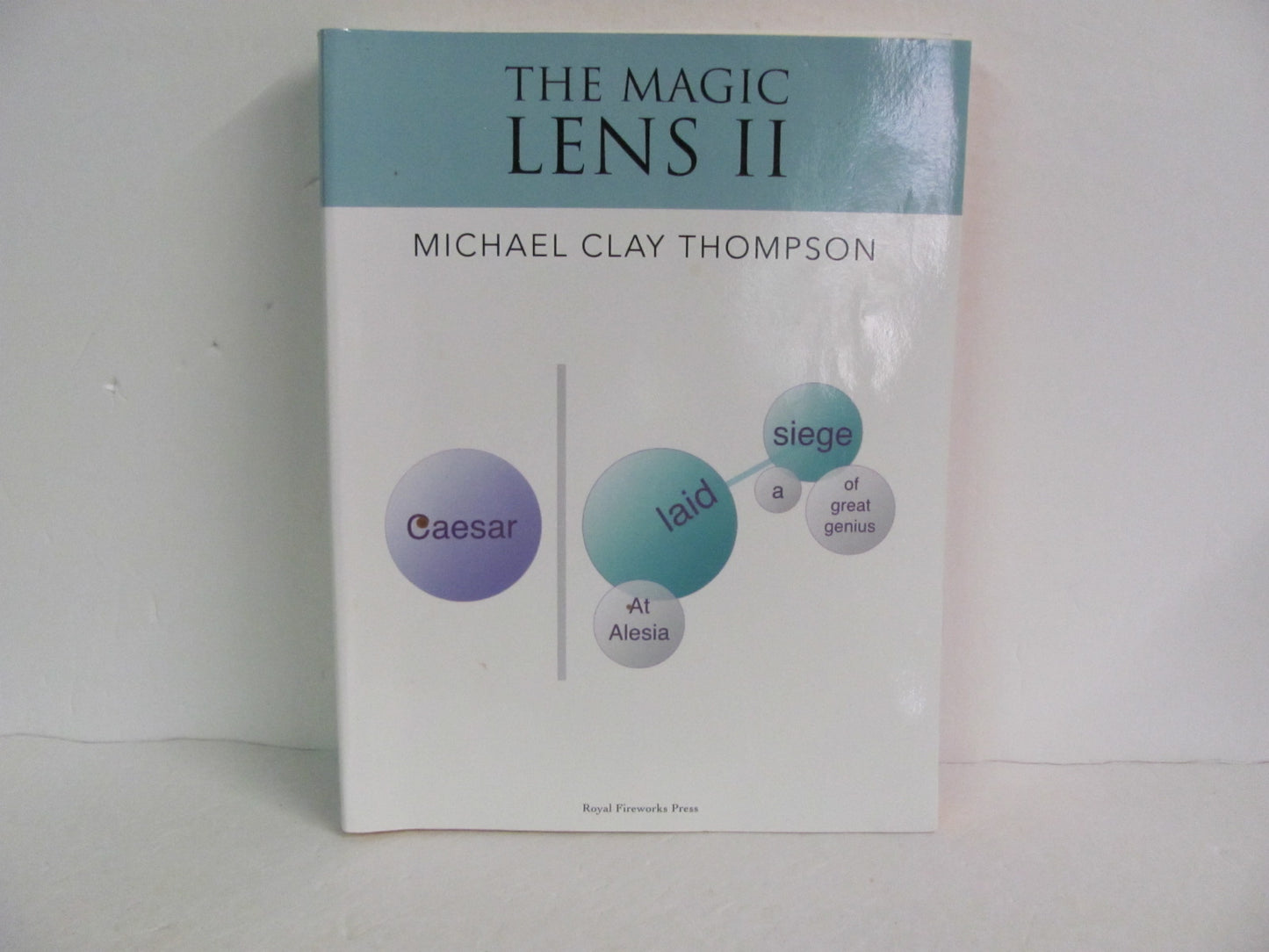 The Magic Lens II Royal Fireworks Pre-Owned Thompson Language Textbooks